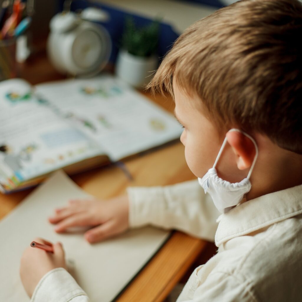 young boy attending online classes amid the Covid pandemic