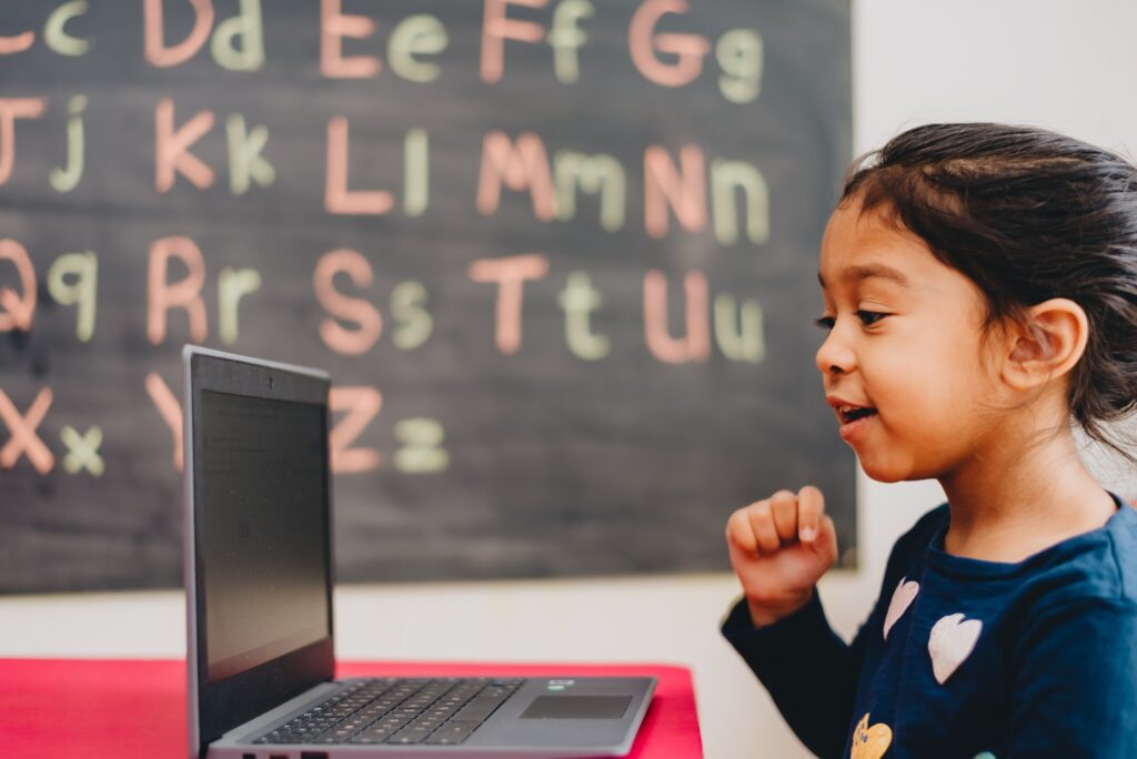 young girl participating in online classes
