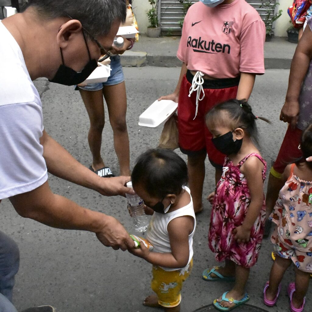 Childhope Philippines' community outreach feeding program