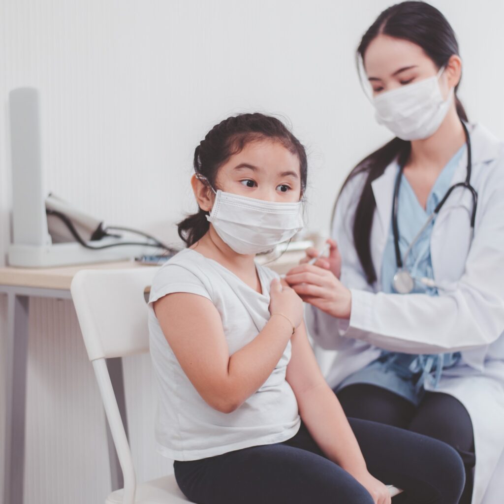 child asian injection dose face mask doctor vaccinating