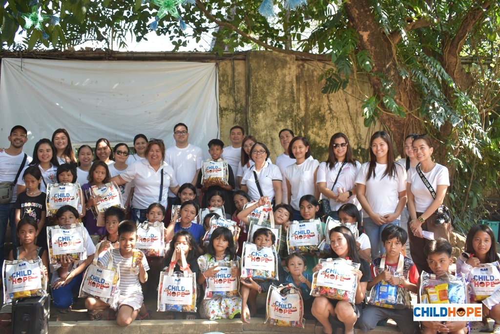 child beneficiaries of Childhope Philippines receiving donations