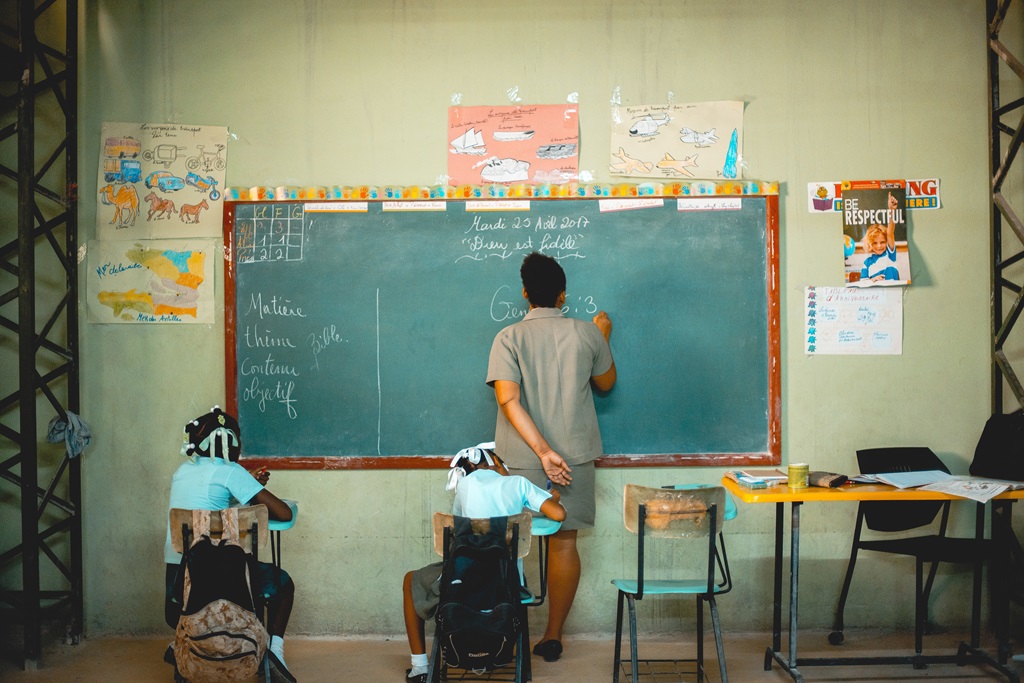 classroom with an empty seat symbolizing student dropouts