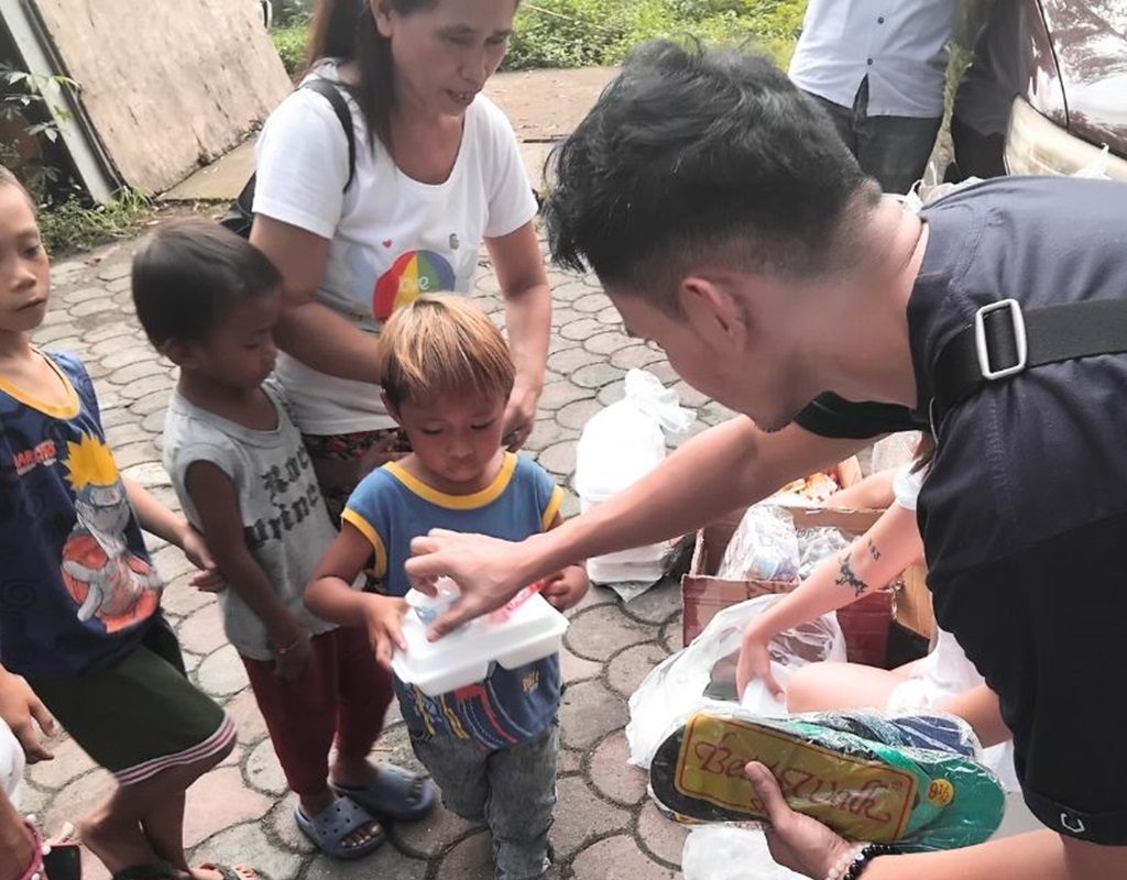 children from the lower sector receiving donations