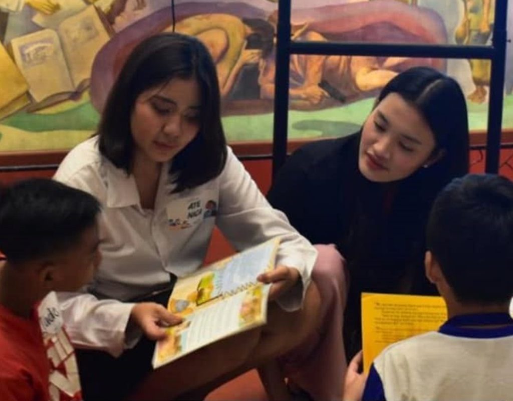 children learning with volunteer educators addressing lack of education